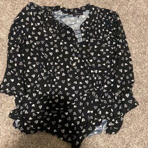 Black shirt with white hearts